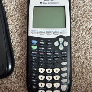 Texas Instruments TI-84 Plus Graphing Calculator in Black and White